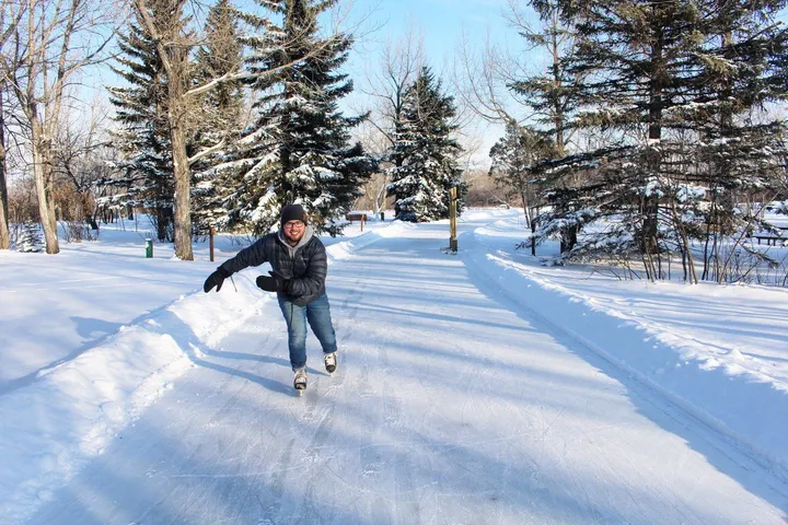 man skating happily