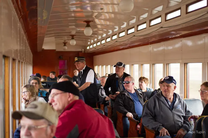 ogema train people looking out